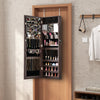 Jewelry mirror cabinet with full-length mirror, dark brown finish, ample storage for jewelry, mounted on a door.