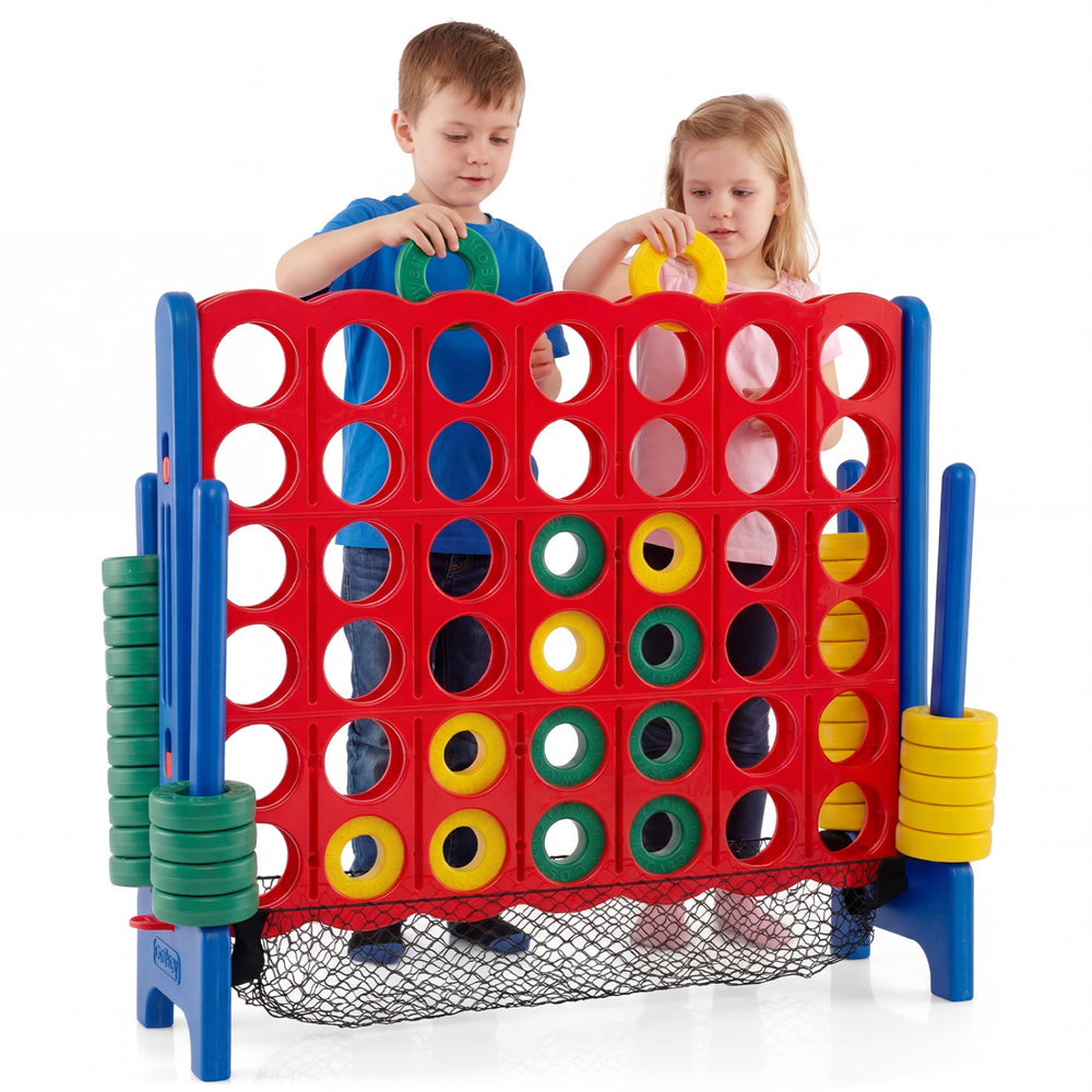 Children playing with the Jumbo 4 in a Row Game Set, featuring red and green chess pieces for indoor and outdoor fun.