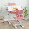 Rotatable book stand on the kid's pink study desk set, ideal for holding books while kids engage in various activities.