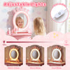 Kids hair salon play set with LED lighted mirror, adjustable brightness, and swivel chair for imaginative play in pink.