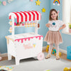 Kids ice cream cart playset in red with a fabric canopy and sliding doors, perfect for developing fine motor skills and.