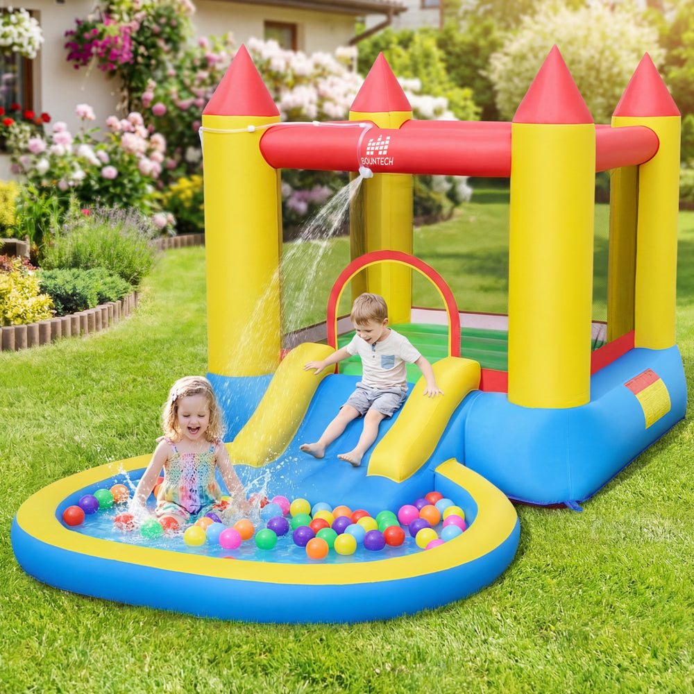 Kids inflatable bounce house castle with water slide and ball pool, designed for safe outdoor fun and imaginative play.