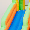 Bright inflatable water slide featuring blue and orange slides, perfect for kids' summer fun in the yard.