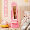 Kids jewelry armoire in pink with a crown design, featuring a full-length mirror and LED lights for organized storage.