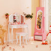 Pink kids jewelry armoire with LED full-length mirror, shown open with organized storage slots and drawers in a child’s room.