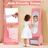 Pink kids jewelry armoire with LED light and full-length mirror, shown open beside a child for jewelry storage.