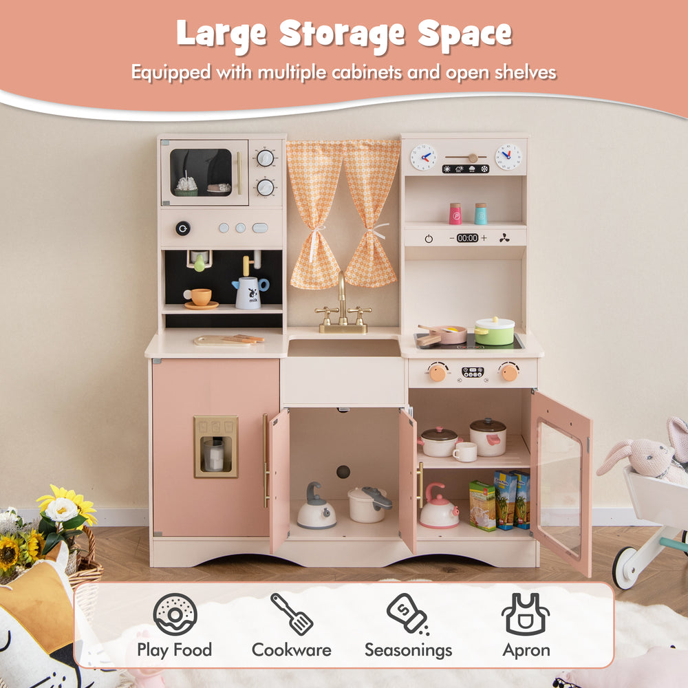 Kids kitchen playset in pink featuring a microwave, coffee maker, and multiple storage cabinets for imaginative play.