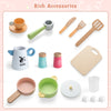 Colorful wooden kitchen accessories including cups, utensils, and a cutting board for kids' cooking playsets.