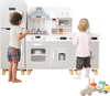 Kids kitchen playset with refrigerator and washing machine, featuring interactive burners and ample storage for play.