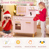 Kids kitchen playset in pink with cooking accessories, dual stoves, and storage for imaginative role-playing fun.
