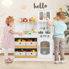 Kids kitchen playset in white with cooking accessories, featuring a sink, stove, and storage drawers for imaginative.