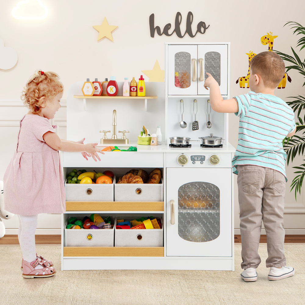 Kids kitchen playset in white with cooking accessories, featuring a sink, stove, and storage drawers for imaginative.