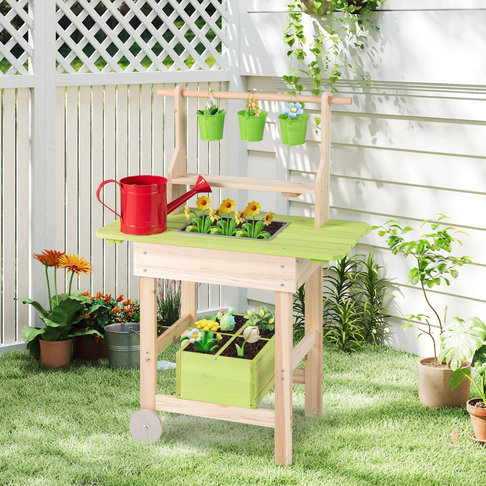 Kids mud kitchen featuring a planting trough, removable pots, and a watering can, perfect for outdoor play and gardening.