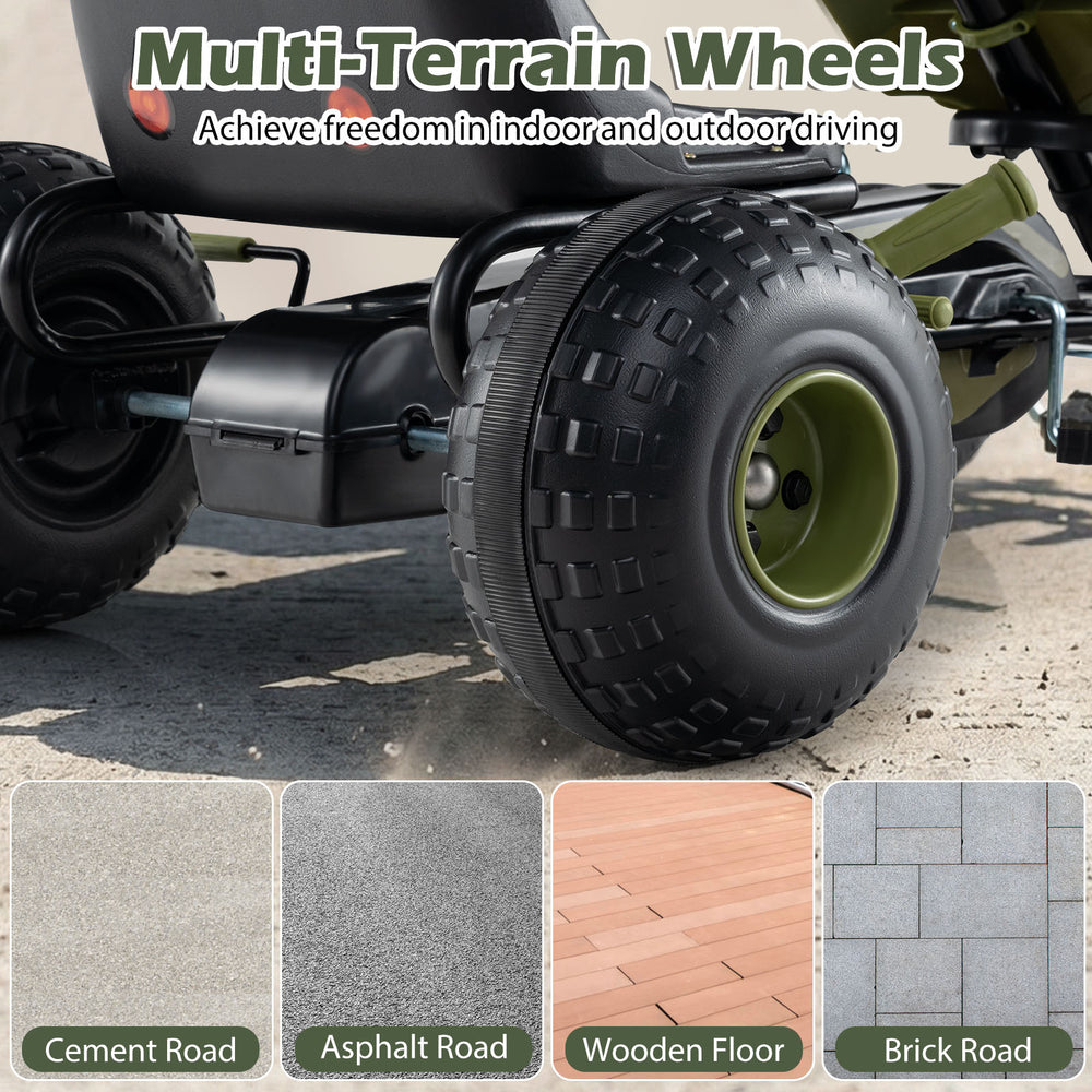 Close-up of multi-terrain wheel on a green kids pedal go kart, designed for various surfaces like gravel and asphalt.
