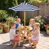 Kids picnic table set with stools and adjustable blue umbrella, perfect for outdoor play and gatherings in the backyard.