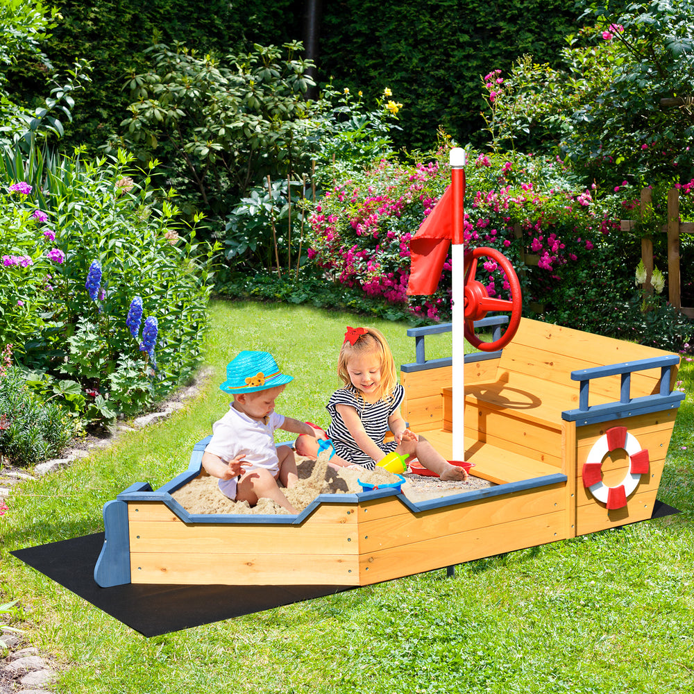 Kids playing in a wooden pirate boat sandbox with lifebuoy and rudder, perfect for outdoor fun and storage.