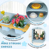 Kids play kitchen set featuring removable flowerpot holders, ample storage, and a blue finish for imaginative role play.