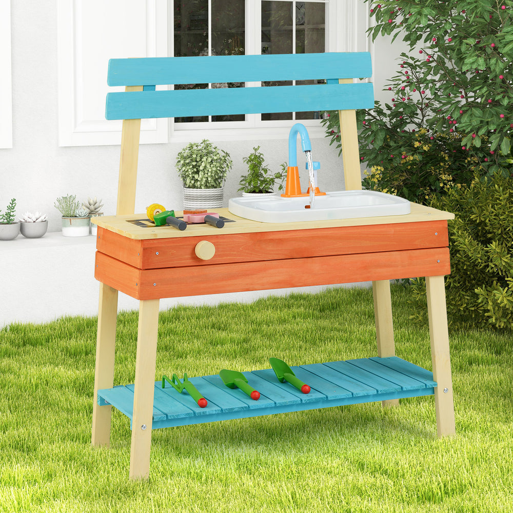 Kids play kitchen set in blue and orange, featuring a sink, grill rack, and gardening tools for interactive outdoor fun.