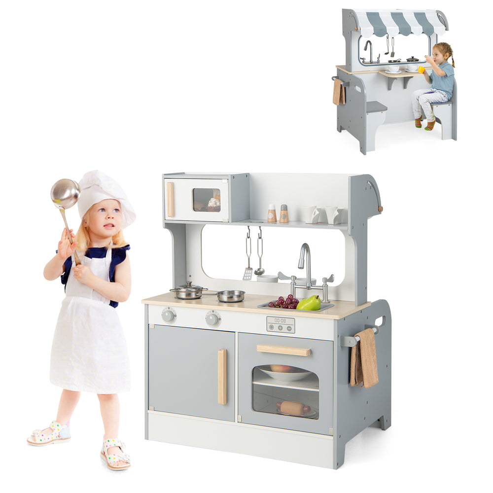 Double-sided kids pretend kitchen playset in gray with oven, microwave, and cafe seating for imaginative cooking fun.