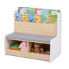 Kids reading nook featuring a white bookshelf with a bench, detachable cushion, and two cubbies for toy storage.