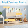 Kids reading nook featuring a white bookshelf, bench with cushion, and toy storage cubbies for organized playtime.