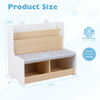 Kids reading nook featuring a white bench bookshelf with two cubbies and a detachable cushion for comfortable seating.