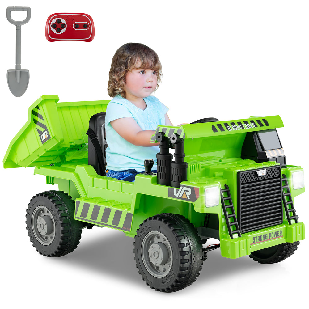 Kids ride-on dump truck in green with electric dump bed, remote control, and toy shovel for outdoor fun.