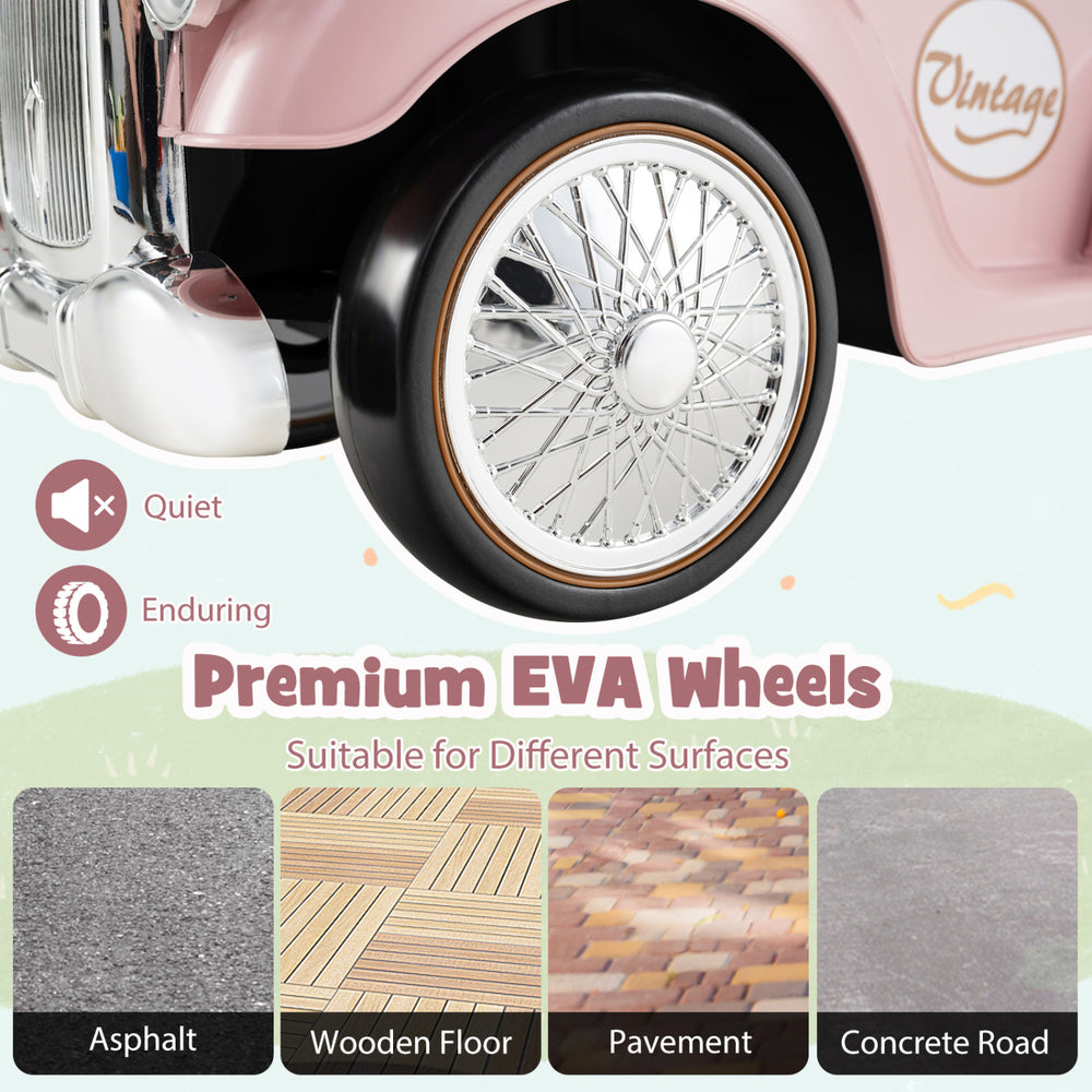 Close-up of premium EVA wheels on a pink kids' sit-to-stand vehicle, suitable for various surfaces like asphalt and.