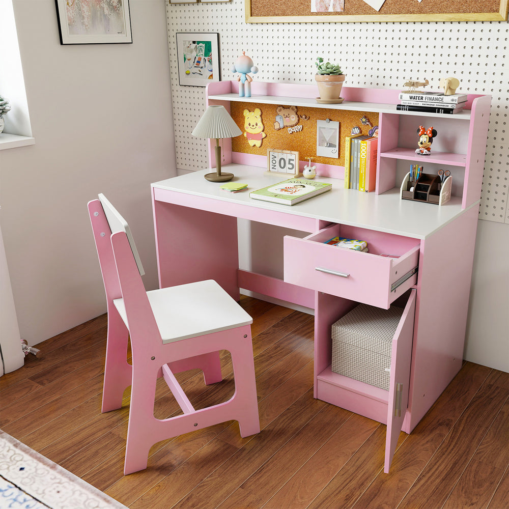 Pink kids study desk featuring a drawer and cabinet for storage, paired with an ergonomic chair for comfortable study.