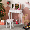 Kids vanity set in pink with tri-fold mirror, storage drawer, and makeup accessories, perfect for children's playroom.
