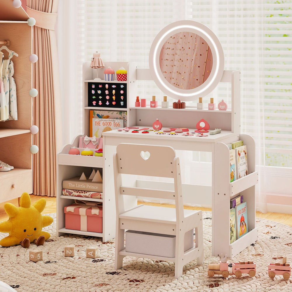 Kids vanity desk in white with a lighted mirror, side bookshelf, and storage for books and accessories in a playful setting.