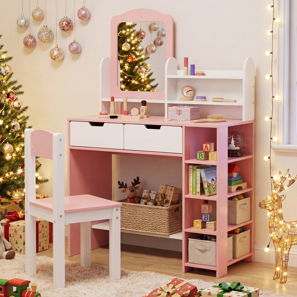Kids vanity set in pink and white with a mirror, storage shelves, and drawers, perfect for a child's room.