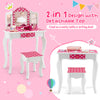 Kids vanity table and stool set in pink with polka dot print, featuring a tri-fold mirror and detachable top for.
