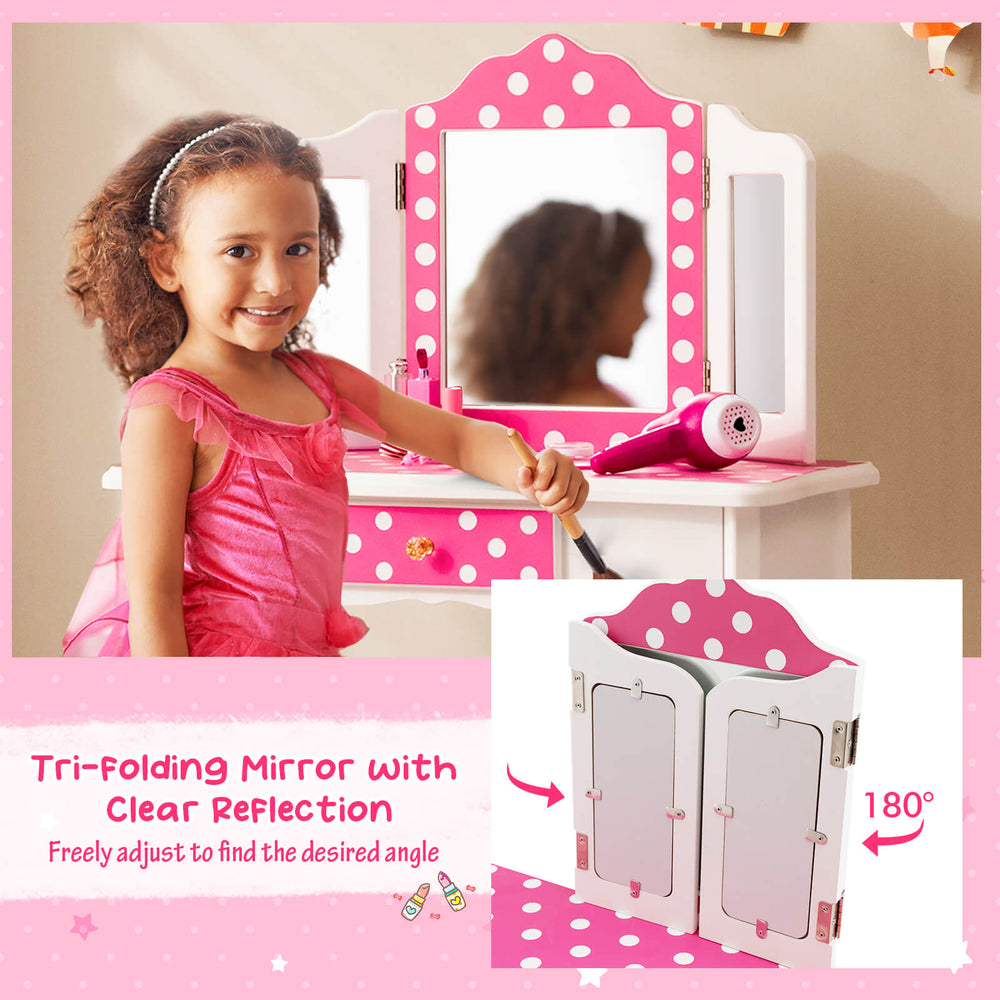 Kids vanity table set with pink polka dot print, featuring a tri-folding mirror for easy styling and ample storage.