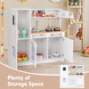 Toddler pretend play kitchen toy in white with stove, sink, and ample storage for imaginative cooking fun.
