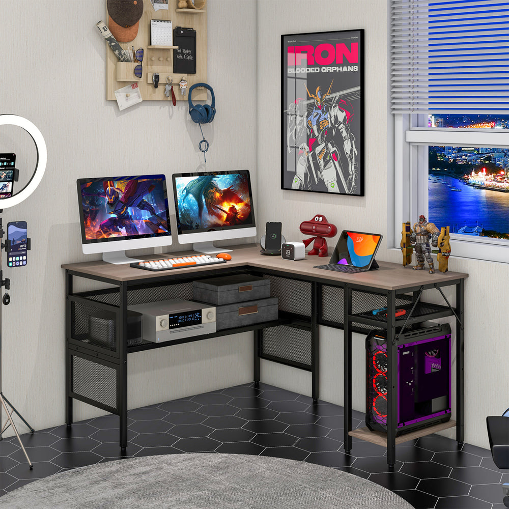 L-shaped computer desk in gray with charging station, adjustable shelf, and sturdy metal frame for home office use.