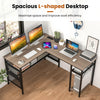 L-shaped computer desk in gray with charging station, adjustable shelf, and spacious design for efficient workspace.