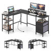 L-shaped black desk with power outlet, adjustable shelves, and reversible monitor stands for versatile workspace.