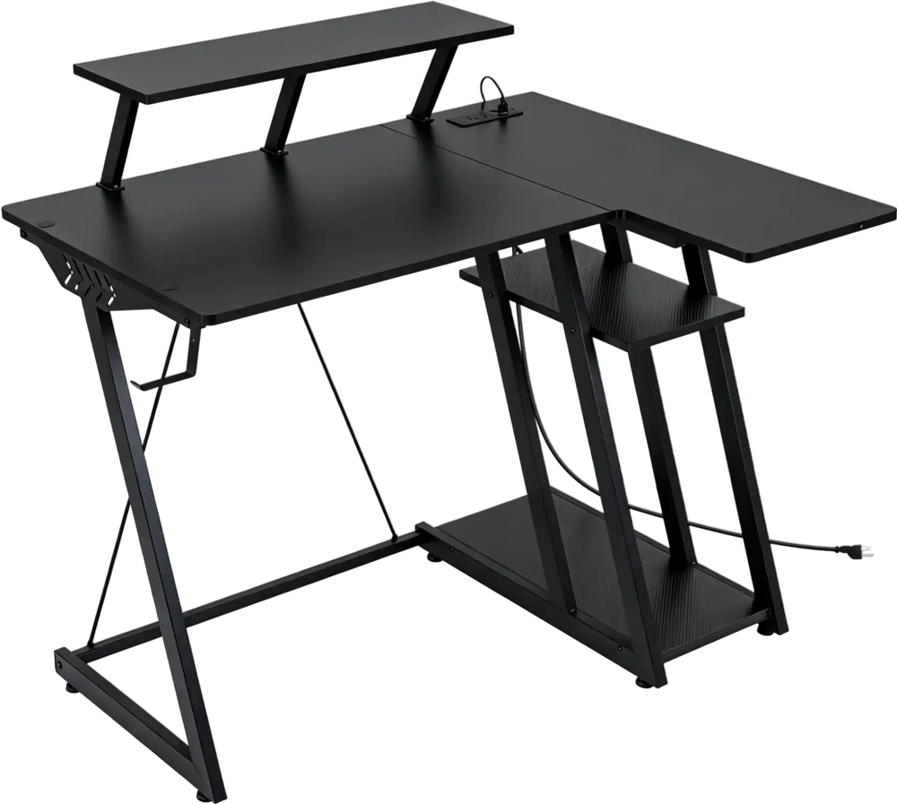 L-shaped gaming desk in black with USB ports, headphone hook, and carbon fiber texture for space-saving and convenience.