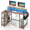 L-shaped gaming desk in rustic brown with LED lights, ample storage, and ergonomic monitor stand for gaming or work.