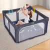 Large dark grey baby playpen with a child and parent, featuring pull-up rings and colorful ocean balls for play.