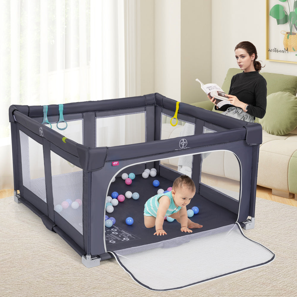 Large dark grey baby playpen with zipper gate, foam pads, and ocean balls for safe play and development indoors or.