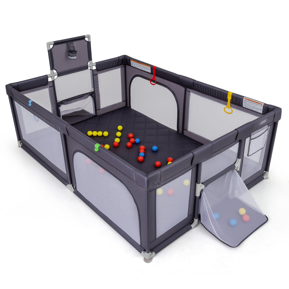 Large dark gray baby playpen with mat, ocean balls, pull rings, and basketball hoop for safe play and fun activities.