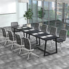 Large black dining table with heavy-duty metal frame, suitable for 4-6 people, ideal for dining or office use.