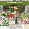 Large walk-in greenhouse with polycarbonate panels, featuring a spacious interior for optimal plant growth and.