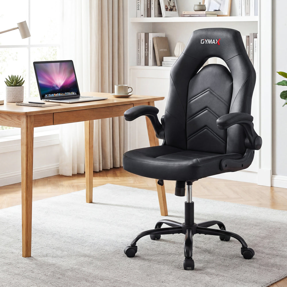 Ergonomic black leather office chair with flip-up armrests and adjustable height, ideal for home or office use.