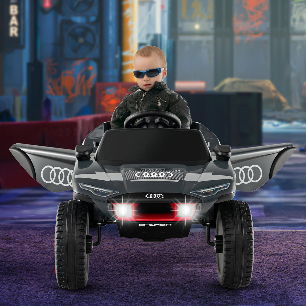 Licensed Audi Kids Ride On E-tron Racing Car in gray with remote control, safety features, and lighted dashboard for.
