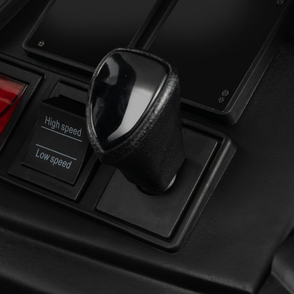 Close-up of the operation lever and speed control buttons for the Licensed Audi Kids Ride On E-tron Racing Car.