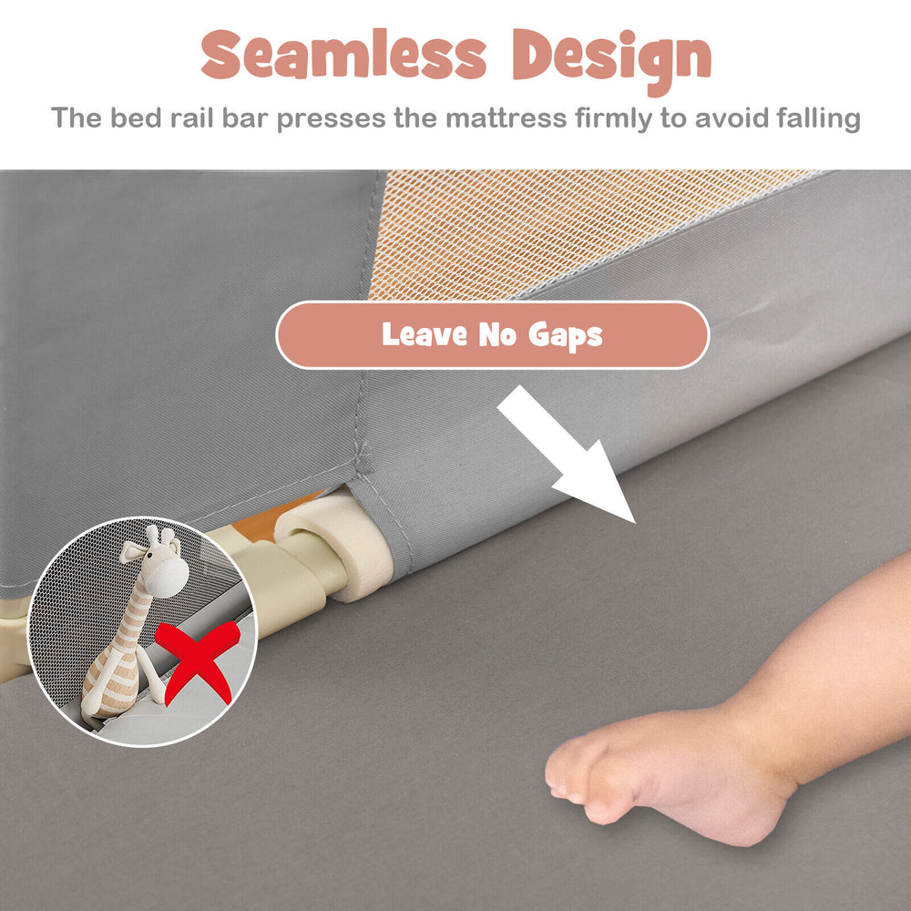 Vertical lifting baby bed rail with seamless design, adjustable height, and anti-collision sponge for safety.