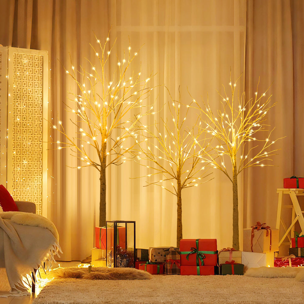 Lighted birch tree set of 3 with warm white LED lights, featuring 4, 5, and 6 ft heights for festive indoor or outdoor.